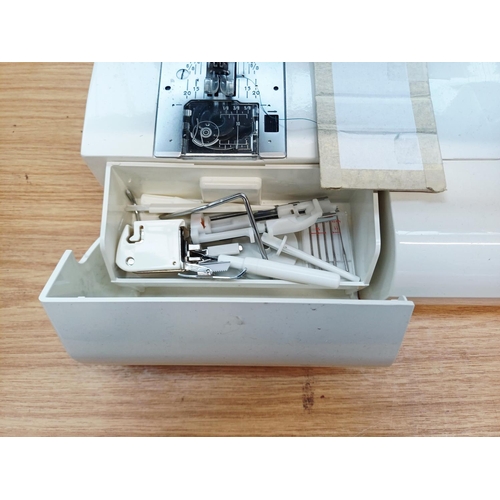 360 - A cased Janome Decor Excel II 5024 electric sewing machine