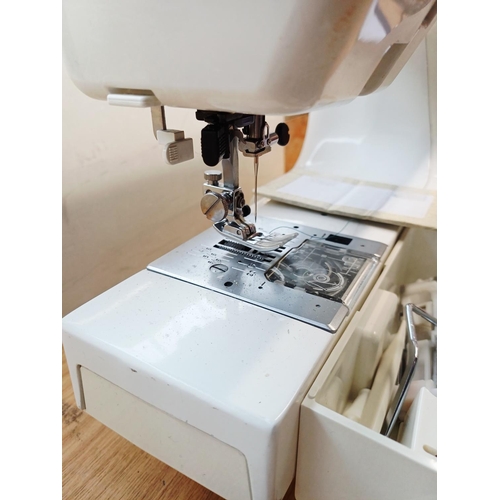 360 - A cased Janome Decor Excel II 5024 electric sewing machine