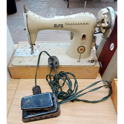361 - An Alfa Challenge electric sewing machine for spares or repair