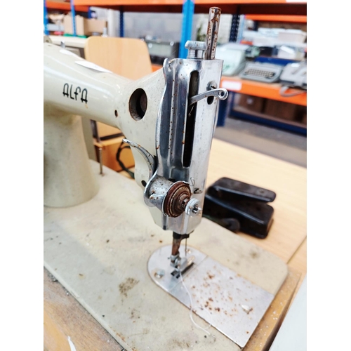 361 - An Alfa Challenge electric sewing machine for spares or repair