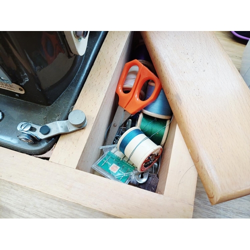 362 - A cased Cresta De Luxe electric sewing machine with foot pedal and accessories