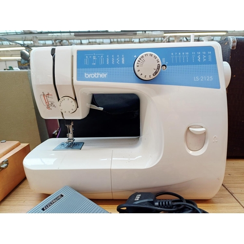 363 - A cased Brother LS-2125 electric sewing machine with foot pedal