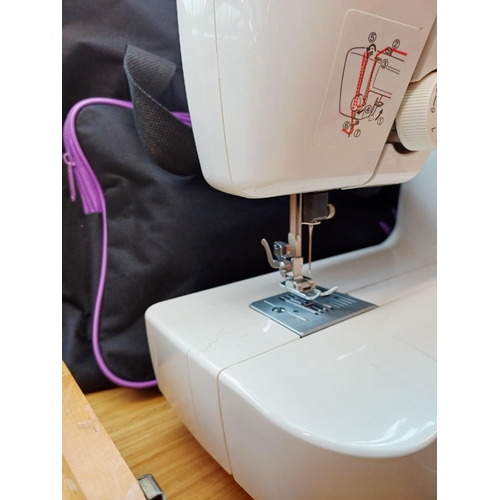 363 - A cased Brother LS-2125 electric sewing machine with foot pedal