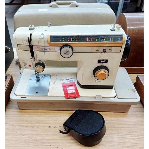365 - A cased Seamstress 8070 electric sewing machine for spares or repair