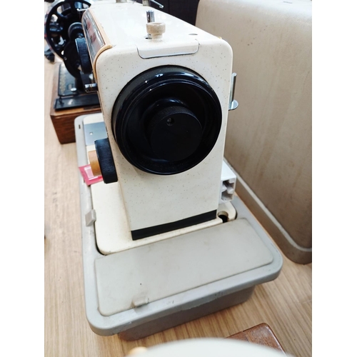 365 - A cased Seamstress 8070 electric sewing machine for spares or repair