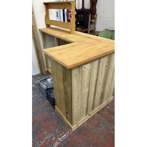 60 - A handmade wooden L shaped home bar with accessories to include drinking glasses, Coors Light drip t... 
