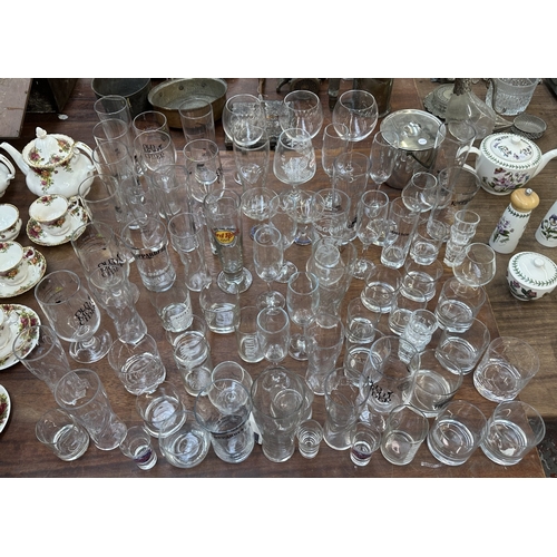 60 - A handmade wooden L shaped home bar with accessories to include drinking glasses, Coors Light drip t... 