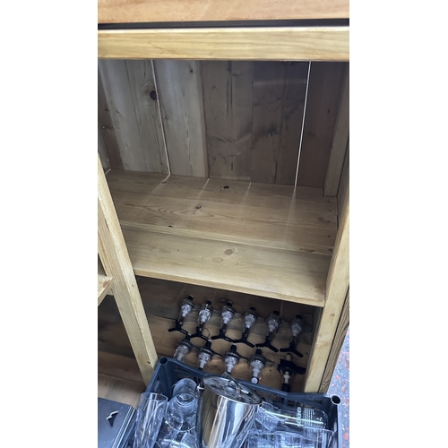 60 - A handmade wooden L shaped home bar with accessories to include drinking glasses, Coors Light drip t... 