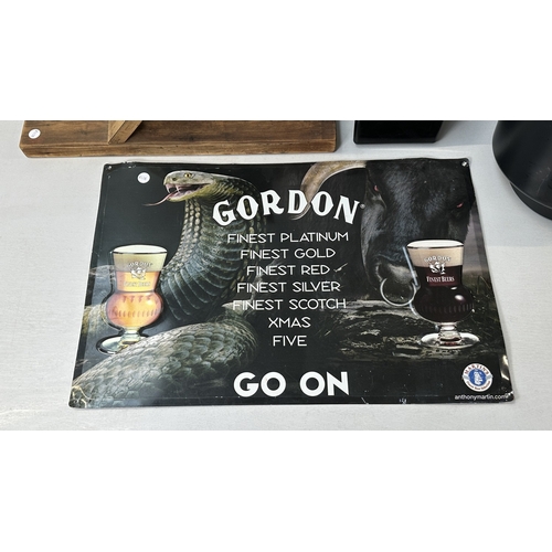 61 - Four advertising items, one Coca-Cola black plastic and metal bottle opener, one Smirnoff black plas... 