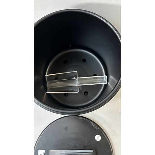 61 - Four advertising items, one Coca-Cola black plastic and metal bottle opener, one Smirnoff black plas... 