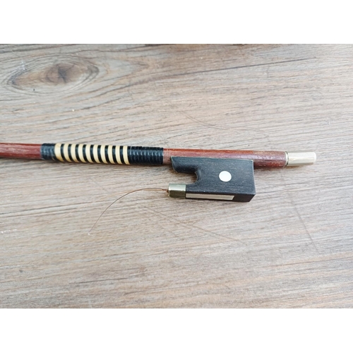 367 - A cased violin with bow