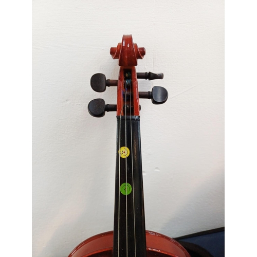 368 - Two child's ½ size musical instruments, one cased Mayflower violin with bow and one nylon strung cla... 