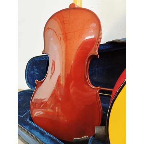 368 - Two child's ½ size musical instruments, one cased Mayflower violin with bow and one nylon strung cla... 