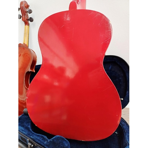 368 - Two child's ½ size musical instruments, one cased Mayflower violin with bow and one nylon strung cla... 
