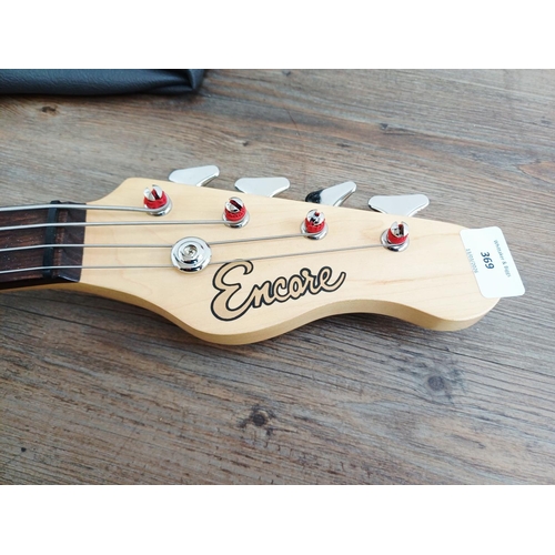 369 - A cased Encore short-scale electric bass guitar with EzetunE MT-1000 electronic chromatic tuner and ... 