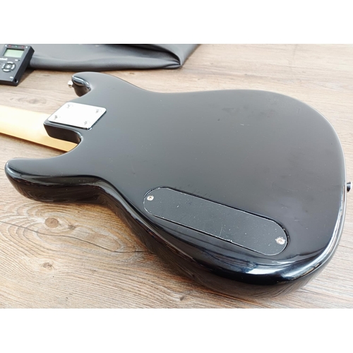 369 - A cased Encore short-scale electric bass guitar with EzetunE MT-1000 electronic chromatic tuner and ... 