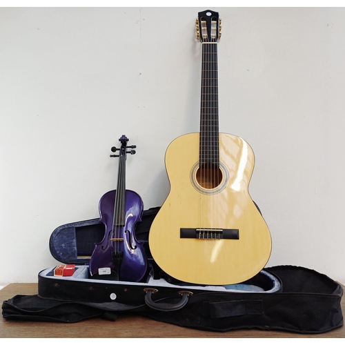 370 - Two cased full-size musical instruments, one The Rainbow Violin Company Ltd. purple violin with bow ... 