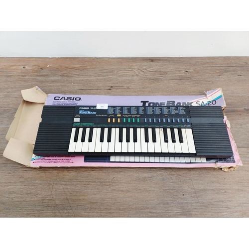 373 - A boxed Casio Tone Bank SA-20 electronic keyboard
