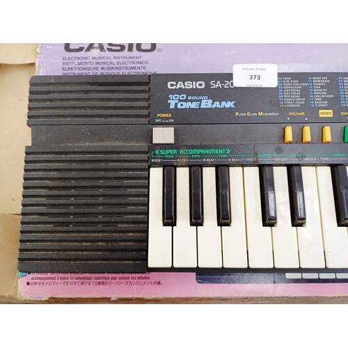 373 - A boxed Casio Tone Bank SA-20 electronic keyboard