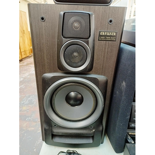 381 - An Aiwa hi-fi system comprising PX-E850K two-speed turntable, GE-Z9400 graphic equaliser, TX-Z9400YE... 