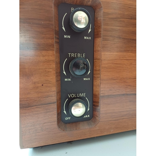 386 - A Dynatron Radio Ltd. record player with Garrard AT6 Mk.IIA four-speed auto-changer turntable