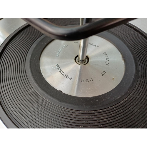 387 - A Deccasound Compact 3 music centre comprising BSR four-speed auto-changer turntable, FM/LW/MW/SW re... 