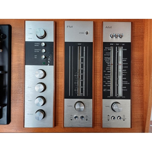 387 - A Deccasound Compact 3 music centre comprising BSR four-speed auto-changer turntable, FM/LW/MW/SW re... 