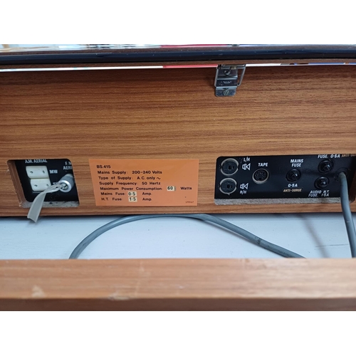 387 - A Deccasound Compact 3 music centre comprising BSR four-speed auto-changer turntable, FM/LW/MW/SW re... 