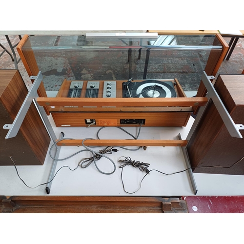 387 - A Deccasound Compact 3 music centre comprising BSR four-speed auto-changer turntable, FM/LW/MW/SW re... 