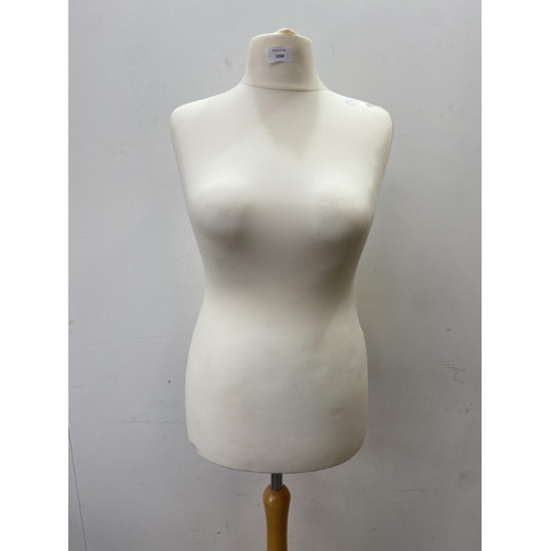 97 - A modern white fabric female mannequin torso on beech tripod stand - approx. 158cm high