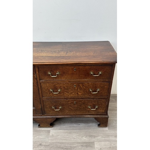 108 - A Georgian oak dresser base - approx. 82cm high x 207cm wide x 52cm deep