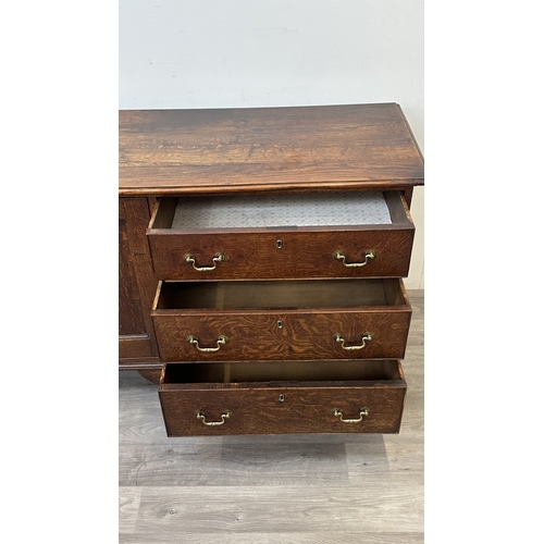 108 - A Georgian oak dresser base - approx. 82cm high x 207cm wide x 52cm deep