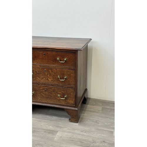 108 - A Georgian oak dresser base - approx. 82cm high x 207cm wide x 52cm deep