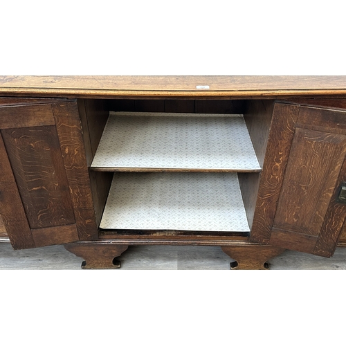 108 - A Georgian oak dresser base - approx. 82cm high x 207cm wide x 52cm deep