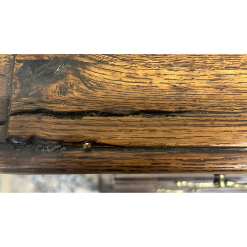 108 - A Georgian oak dresser base - approx. 82cm high x 207cm wide x 52cm deep