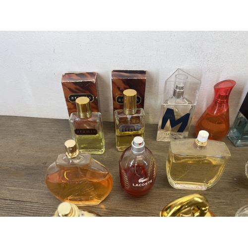 267 - A collection of perfumes and aftershaves to include Ted Baker London, Tom Ford, Joop! Homme etc.