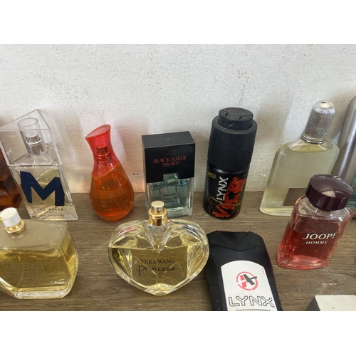 267 - A collection of perfumes and aftershaves to include Ted Baker London, Tom Ford, Joop! Homme etc.