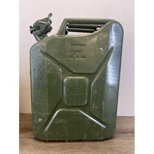 259 - Two fuel cans, one early/mid 20th century Shell and one 20L green steel