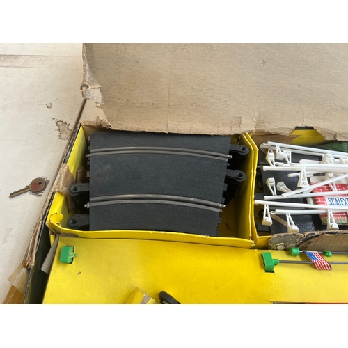 340 - A boxed mid 20th century Scalextric Model Motor Racing slot car set