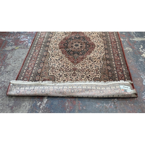 132 - A Belgian Classic pure new wool pile rug - approx. 300cm x 200cm
