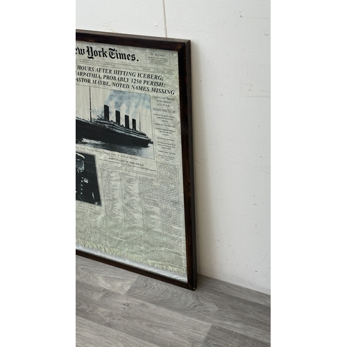 142 - A framed reproduction The New York Times 'Titanic' Tuesday, April 16th, 1912 newspaper print, publis... 