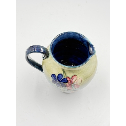 179 - A Moorcroft Spring Flowers pattern jug - approx. 15.5cm high