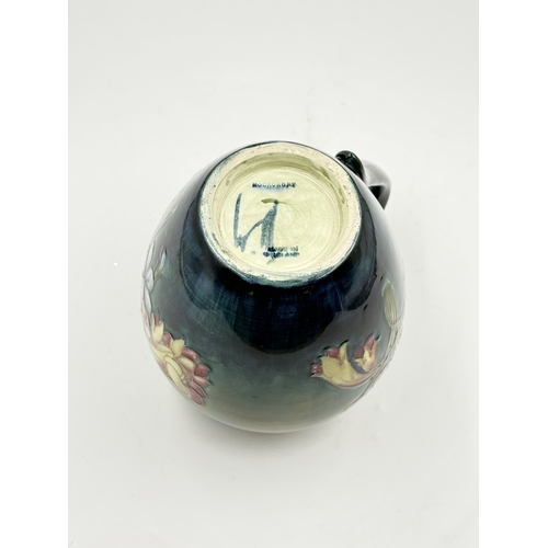 179 - A Moorcroft Spring Flowers pattern jug - approx. 15.5cm high