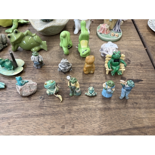 242 - Approx. thirty nine various frog figurines to include ceramic, resin etc. together with a ceramic sn... 