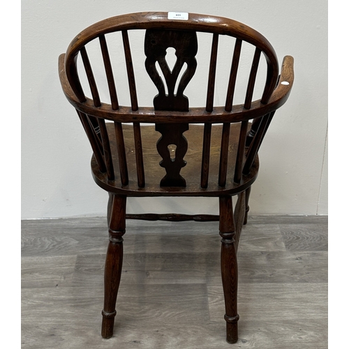 104 - A 19th century elm and ash Windsor armchair - approx. 88cm high x 63cm wide x 54cm deep