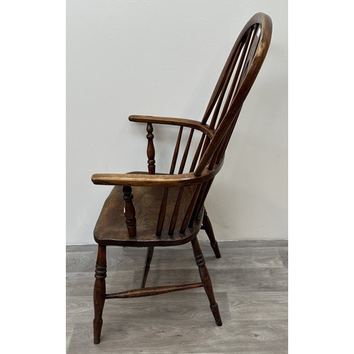 106 - A 19th century elm, ash and beech Windsor armchair - approx. 108cm high