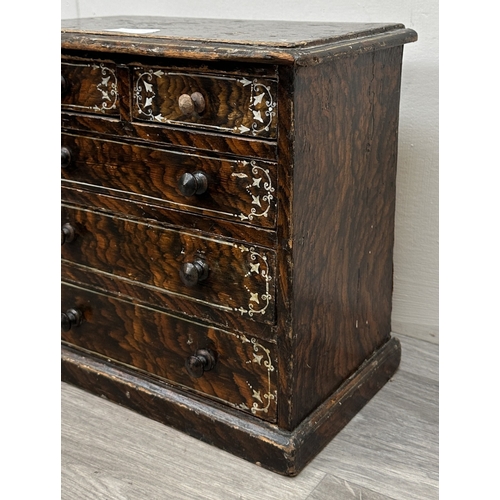 107A - A late 19th/early 20th century brown lacquered and hand painted wooden miniature apprentice piece ch... 