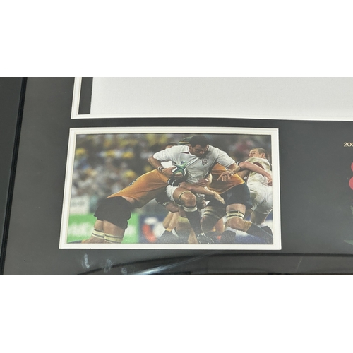 110 - A framed England Rugby 2003 World Cup Champions shirt signed by Martin Johnson - approx. 102cm high ... 