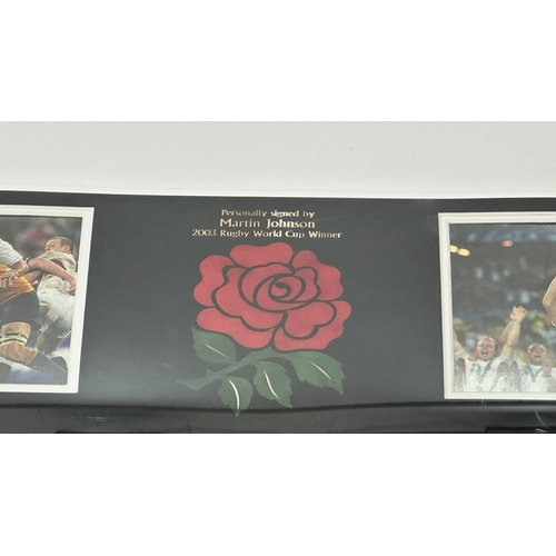 110 - A framed England Rugby 2003 World Cup Champions shirt signed by Martin Johnson - approx. 102cm high ... 
