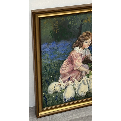 116A - A late 20th century gilt framed oil on canvas titled 'Alice in Wonderland, Feeding the Rabbits' afte... 